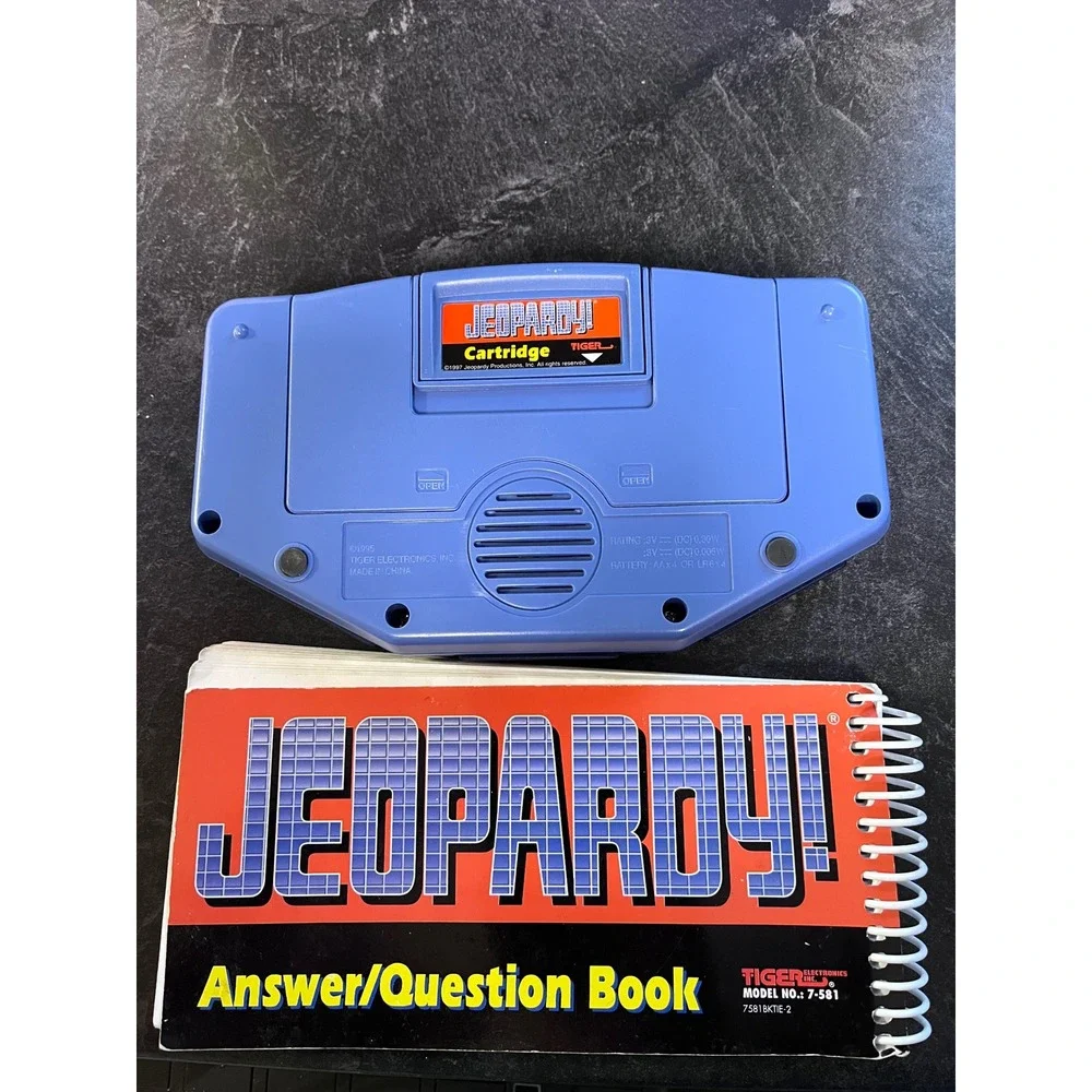 Tiger Electronics‎ Jeopardy Electronic Handheld Game 1997 with Answer  Book